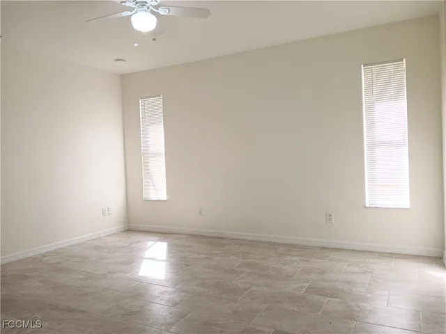 an empty room with windows