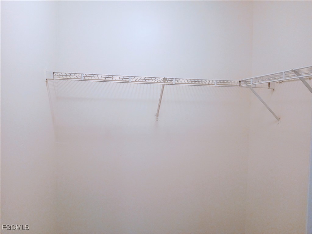 4613-4615 29th Street Southwest Lehigh Acres, FL 33973 - Photo 26 of 33 a view of a room with racks on the wall