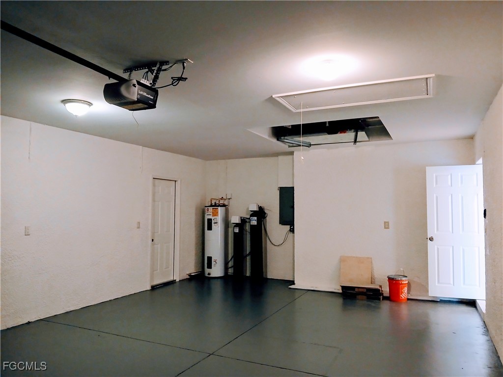 4613-4615 29th Street Southwest Lehigh Acres, FL 33973 - Photo 30 of 33 a view of a room with gym equipment