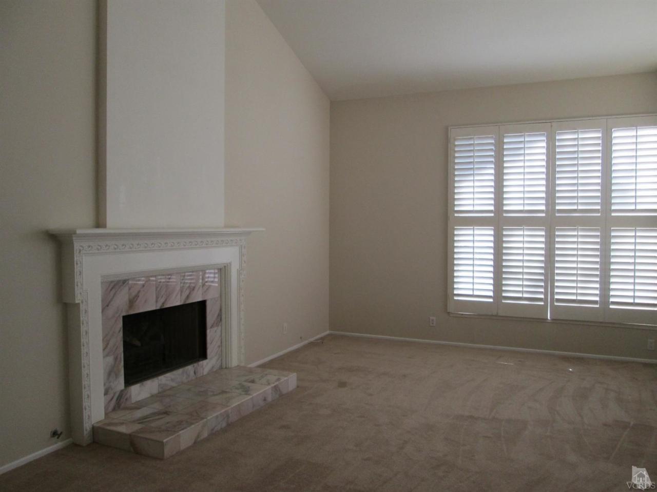 2287 Birchfield Street Simi Valley, CA 93065 - Photo 2 of 22 a view of empty room with a fireplace