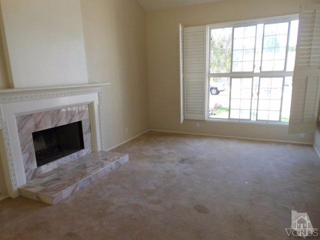 2287 Birchfield Street Simi Valley, CA 93065 - Photo 7 of 22 a view of empty room with a fireplace