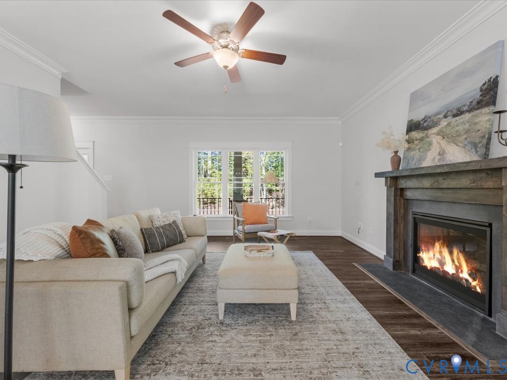 1280 Mill Quarter Road Powhatan, VA 23139 - Photo 11 of 50 Living area featuring ornamental molding, dark woo