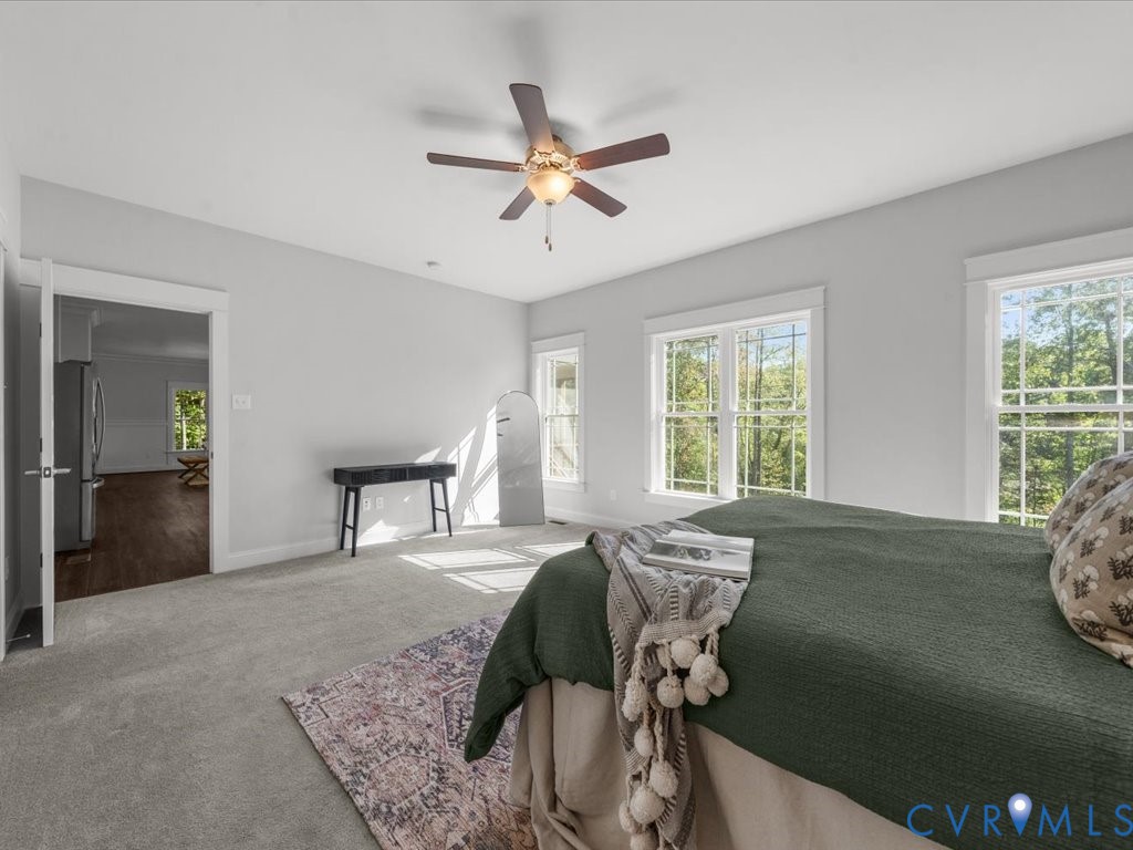 1280 Mill Quarter Road Powhatan, VA 23139 - Photo 22 of 50 Carpeted bedroom featuring freestanding refrigerat