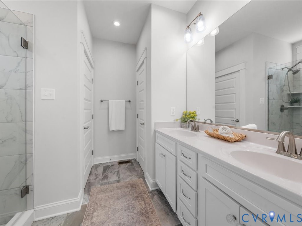 1280 Mill Quarter Road Powhatan, VA 23139 - Photo 24 of 50 Full bath featuring a shower stall, double vanity,