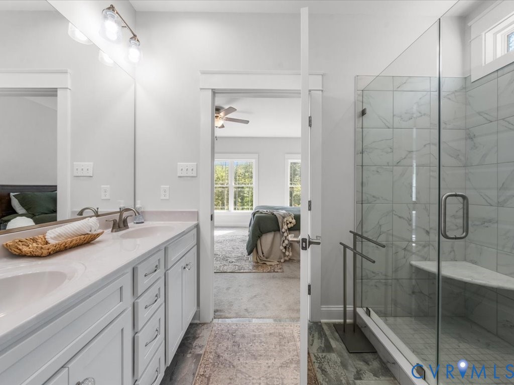 1280 Mill Quarter Road Powhatan, VA 23139 - Photo 25 of 50 Ensuite bathroom with a shower stall, double vanit