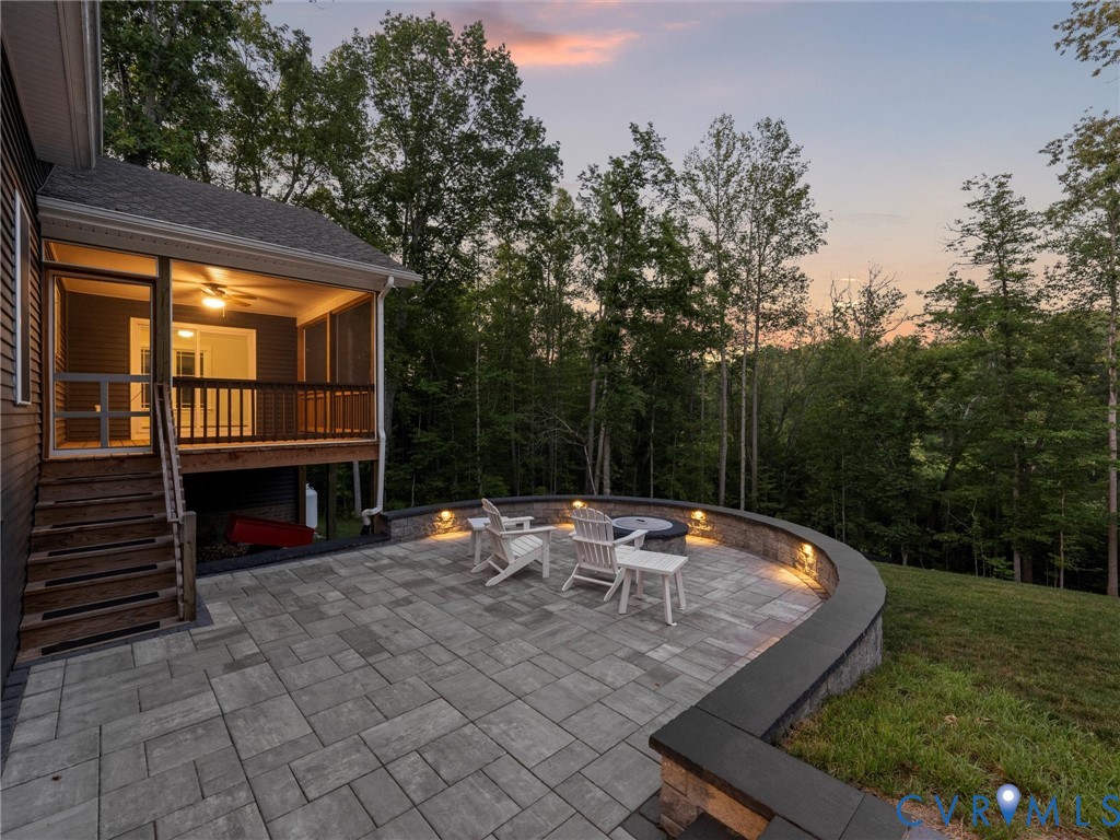 1280 Mill Quarter Road Powhatan, VA 23139 - Photo 3 of 50 View of patio / terrace with an outdoor fire pit,