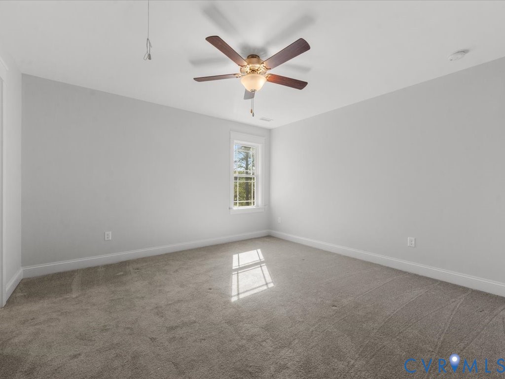 1280 Mill Quarter Road Powhatan, VA 23139 - Photo 32 of 50 Unfurnished room with light colored carpet and a c