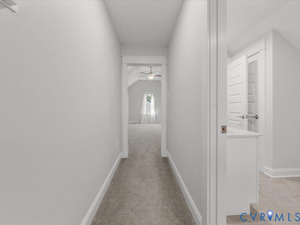 1280 Mill Quarter Road Powhatan, VA 23139 - Photo 34 of 50 Hallway with vaulted ceiling and light colored car