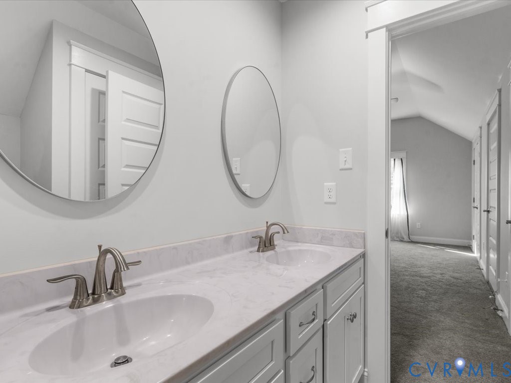 1280 Mill Quarter Road Powhatan, VA 23139 - Photo 35 of 50 Bathroom featuring lofted ceiling and double vanit