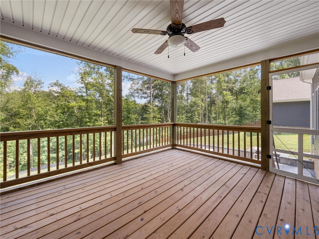 1280 Mill Quarter Road Powhatan, VA 23139 - Photo 38 of 50 Wooden deck with view of wooded area, a sunroom, a