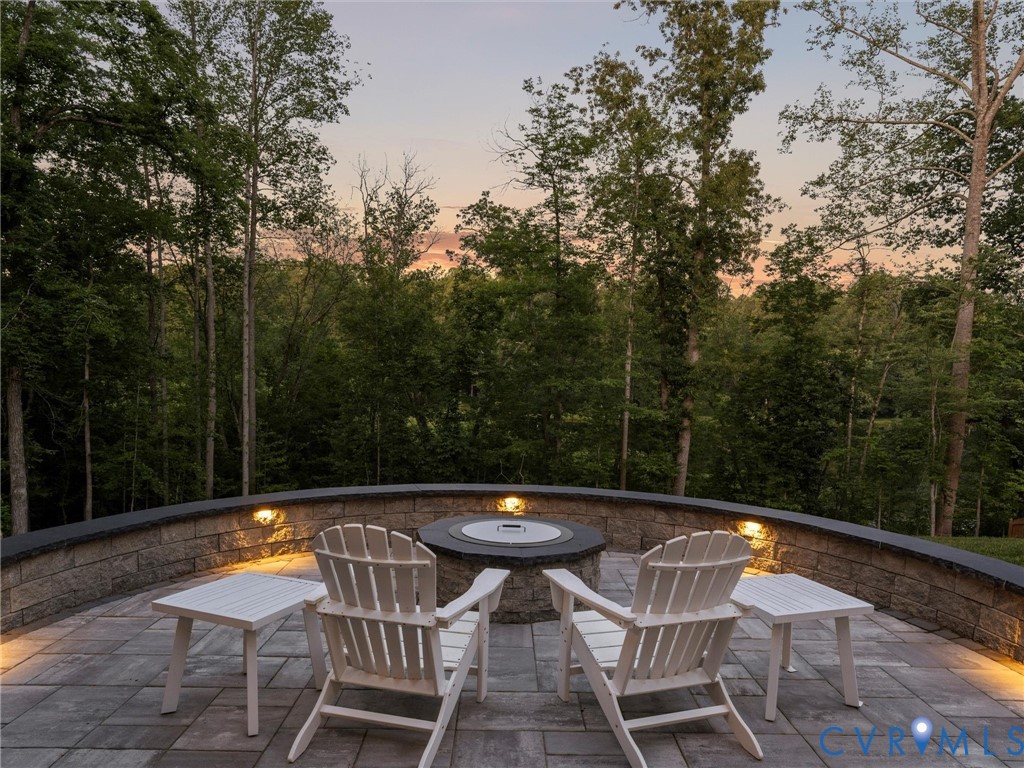 1280 Mill Quarter Road Powhatan, VA 23139 - Photo 40 of 50 Patio terrace at dusk featuring a fire pit, a fore
