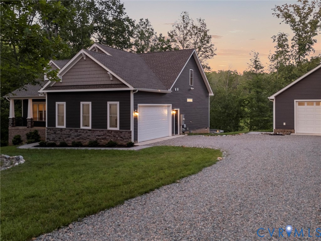 1280 Mill Quarter Road Powhatan, VA 23139 - Photo 42 of 50 View of front of property featuring a garage, roof