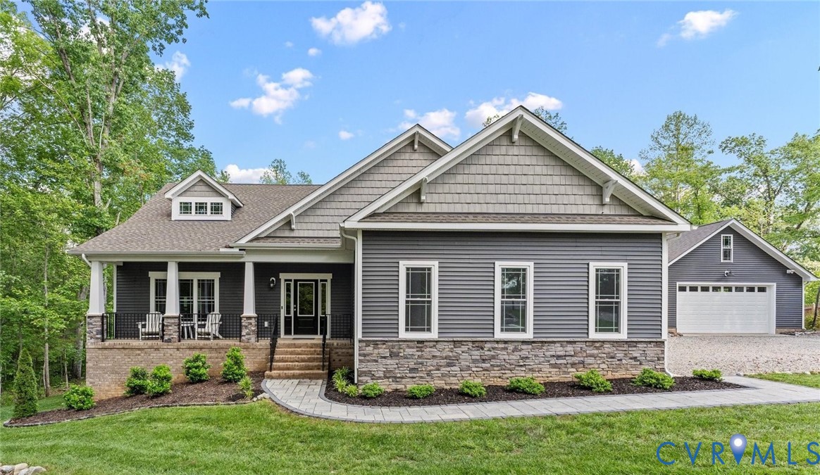 1280 Mill Quarter Road Powhatan, VA 23139 - Photo 46 of 50 Craftsman house with stone siding, a front lawn, a