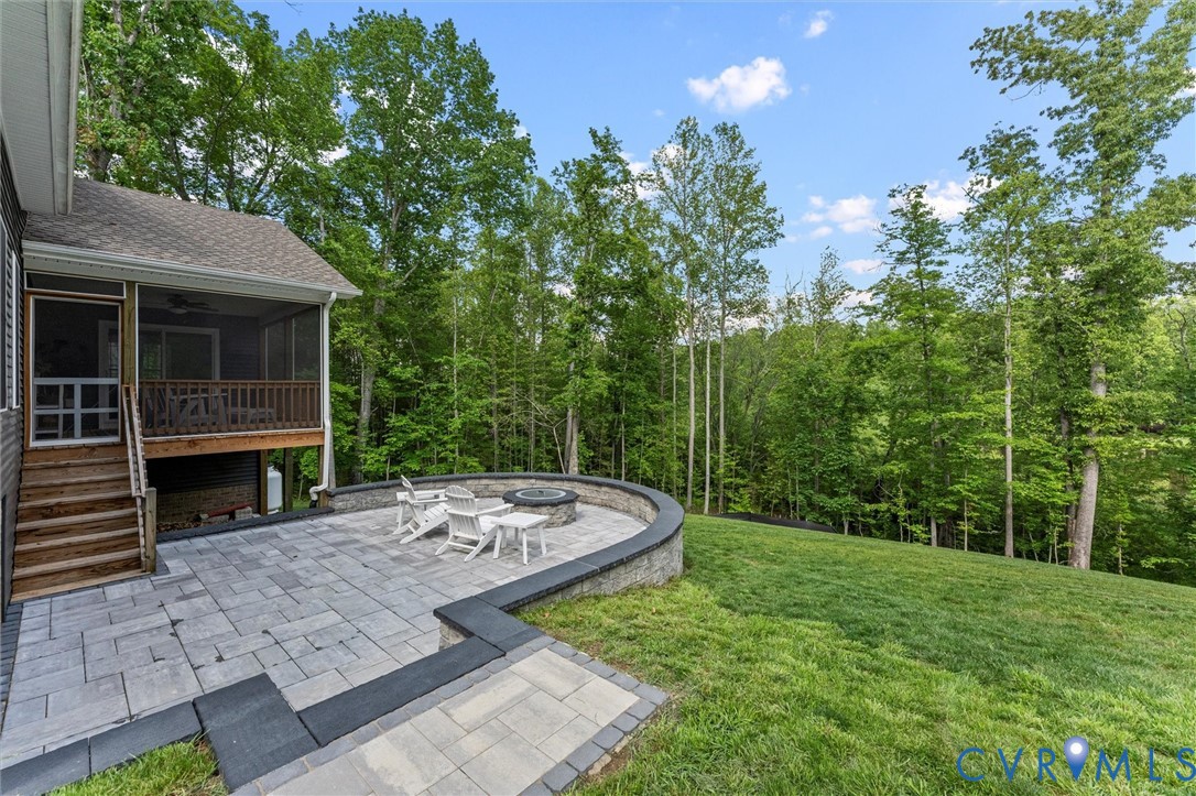 1280 Mill Quarter Road Powhatan, VA 23139 - Photo 49 of 50 View of green lawn featuring a patio, a sunroom, a
