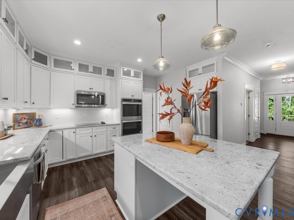 1280 Mill Quarter Road Powhatan, VA 23139 - Photo 5 of 50 Kitchen featuring white cabinets, backsplash, ligh