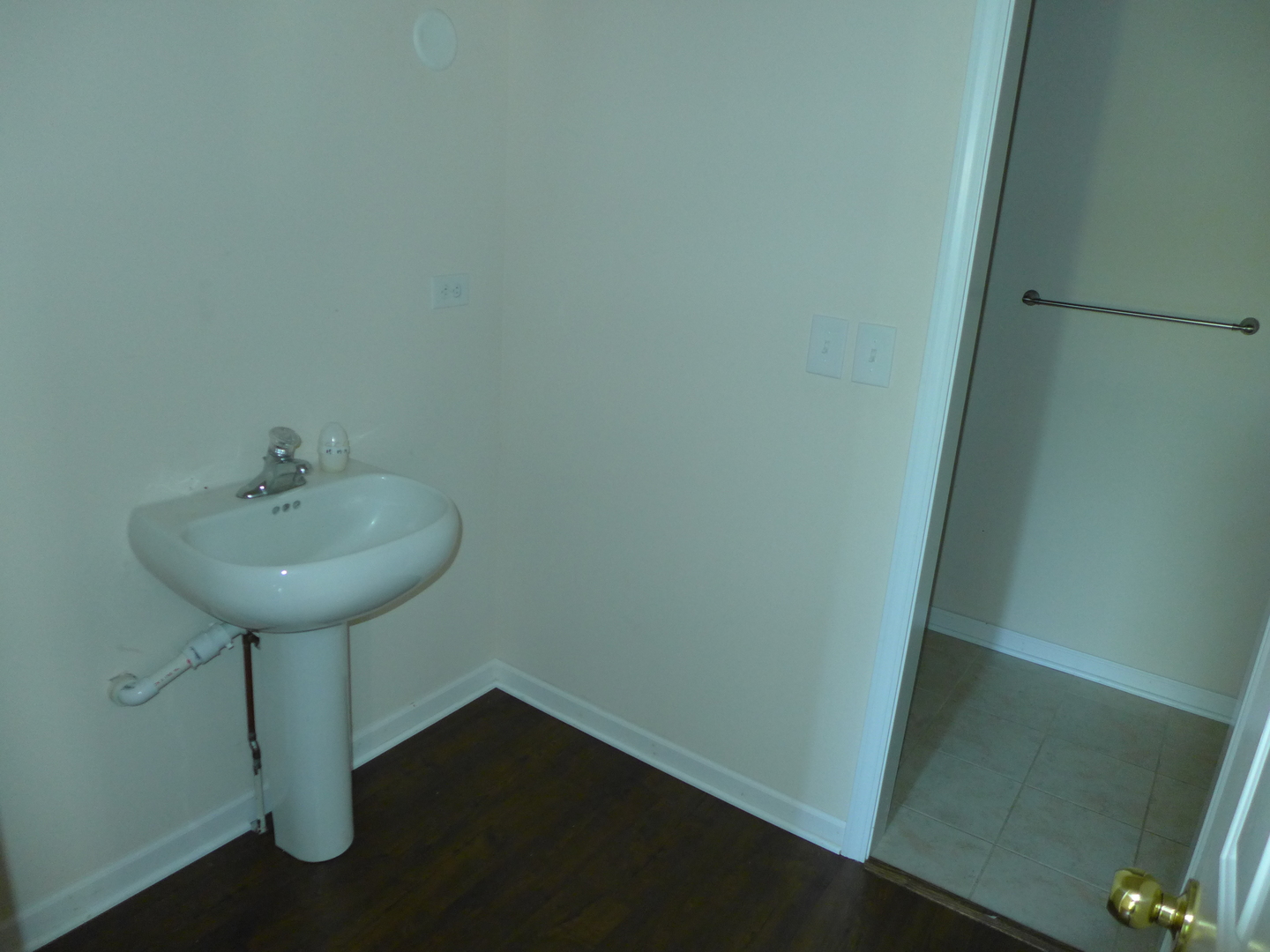 6316 Johnsburg Road Spring Grove, IL 60081 - Photo 18 of 29 a bathroom with a sink and a mirror