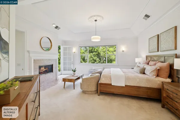 a bed room with a bed and a chandelier