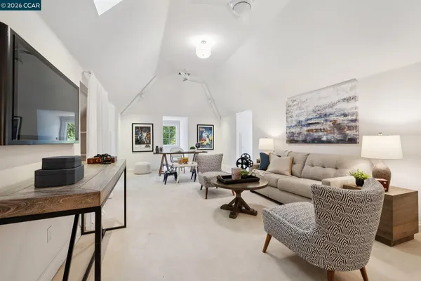 a living room with a couch and a table