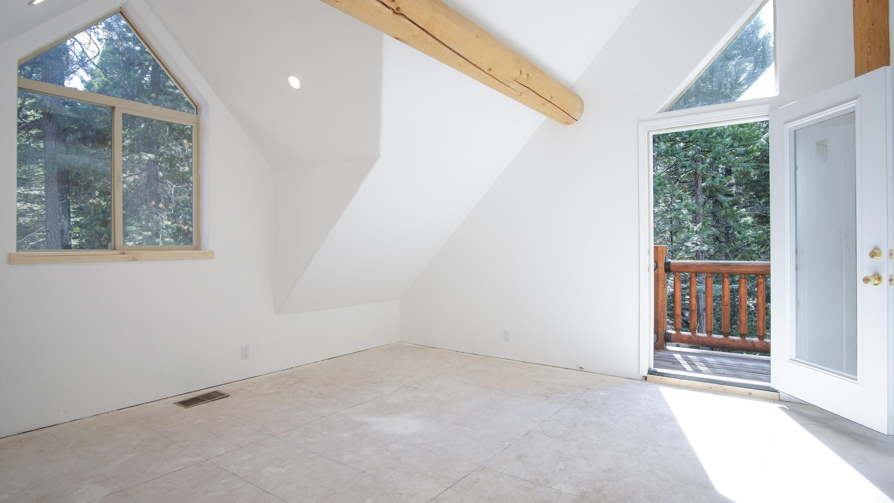 8118 Pine Forest Road Shingletown, CA 96088 - Photo 14 of 38 an empty room with windows