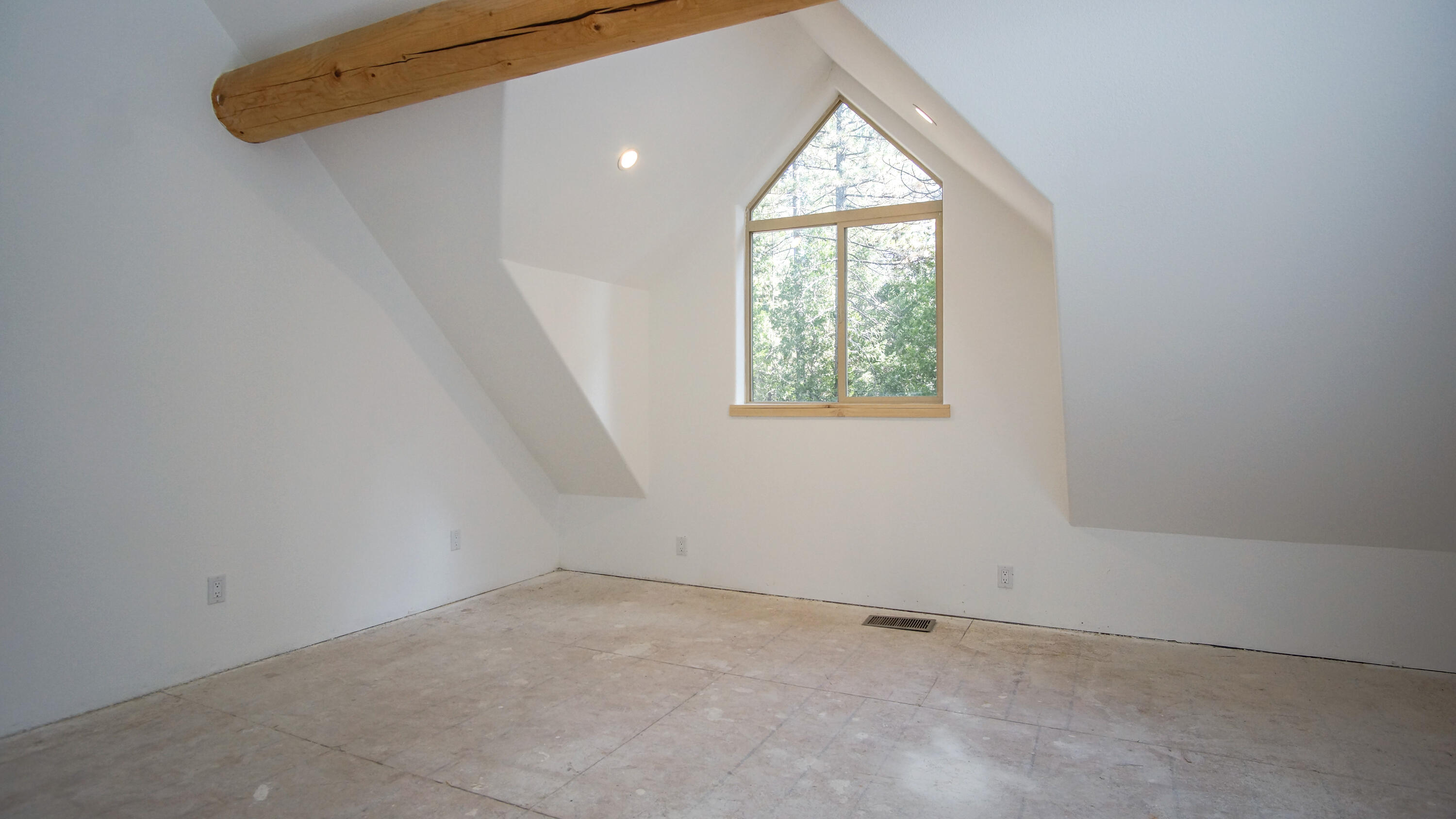 8118 Pine Forest Road Shingletown, CA 96088 - Photo 19 of 38 an empty room with a window