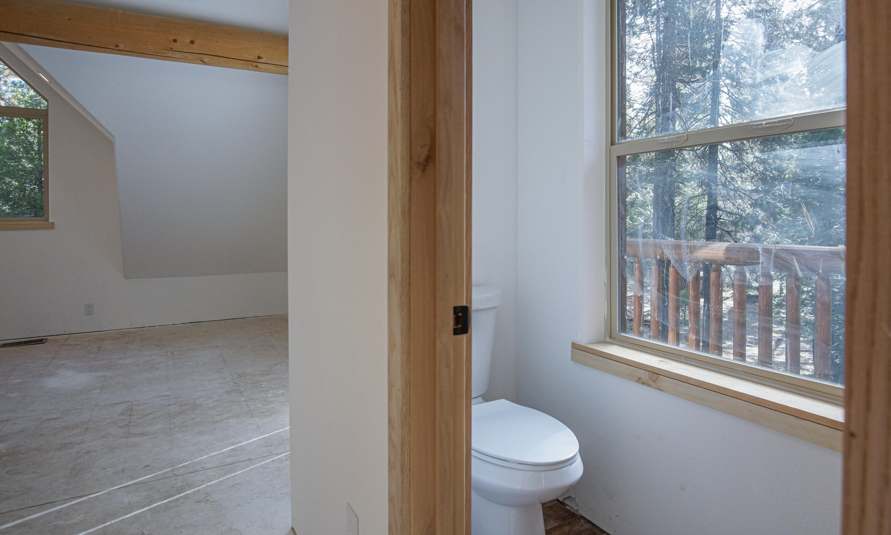 8118 Pine Forest Road Shingletown, CA 96088 - Photo 23 of 38 a bathroom with a toilet and a shower