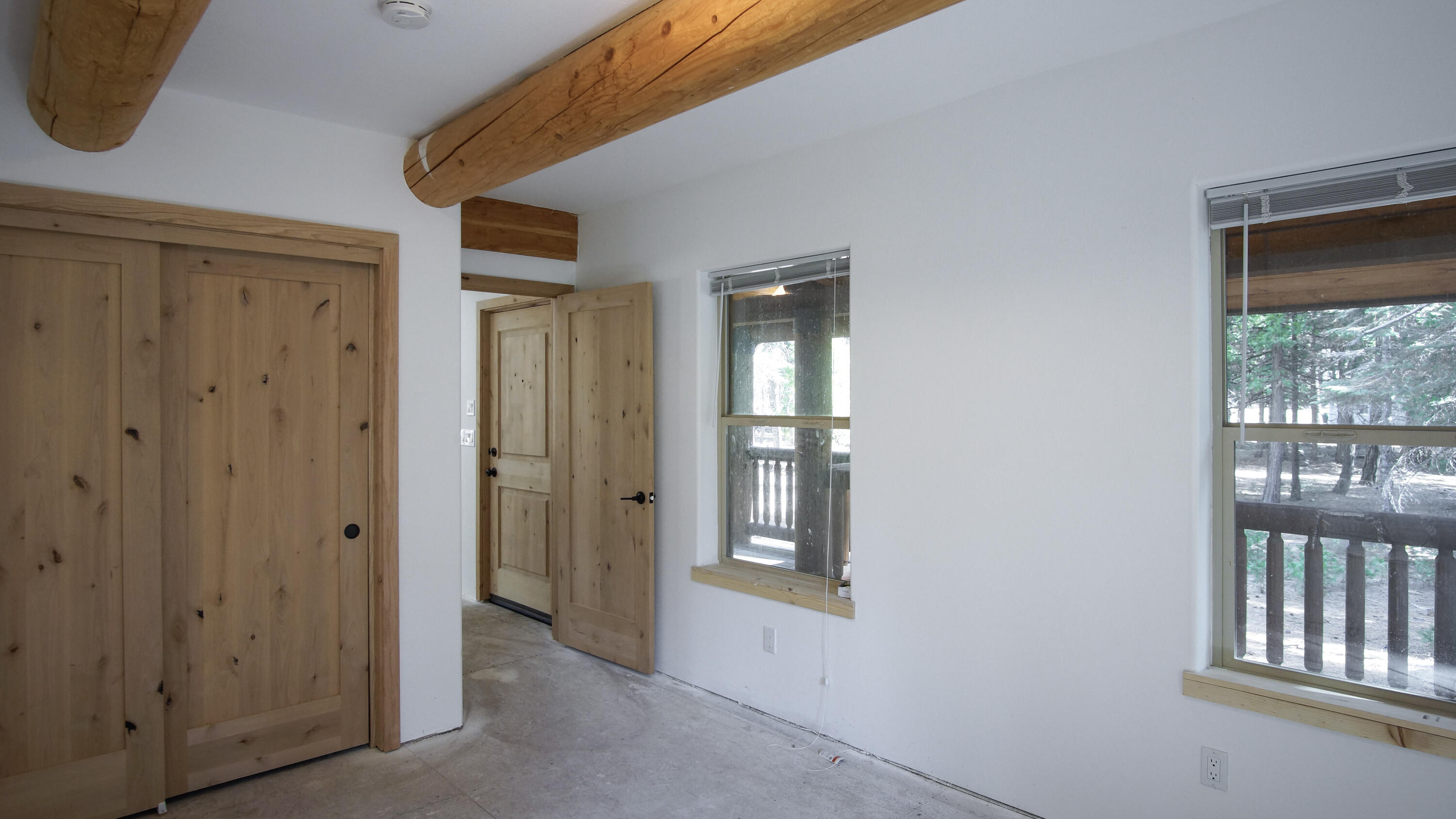 8118 Pine Forest Road Shingletown, CA 96088 - Photo 30 of 38 a view of an empty room with glass door
