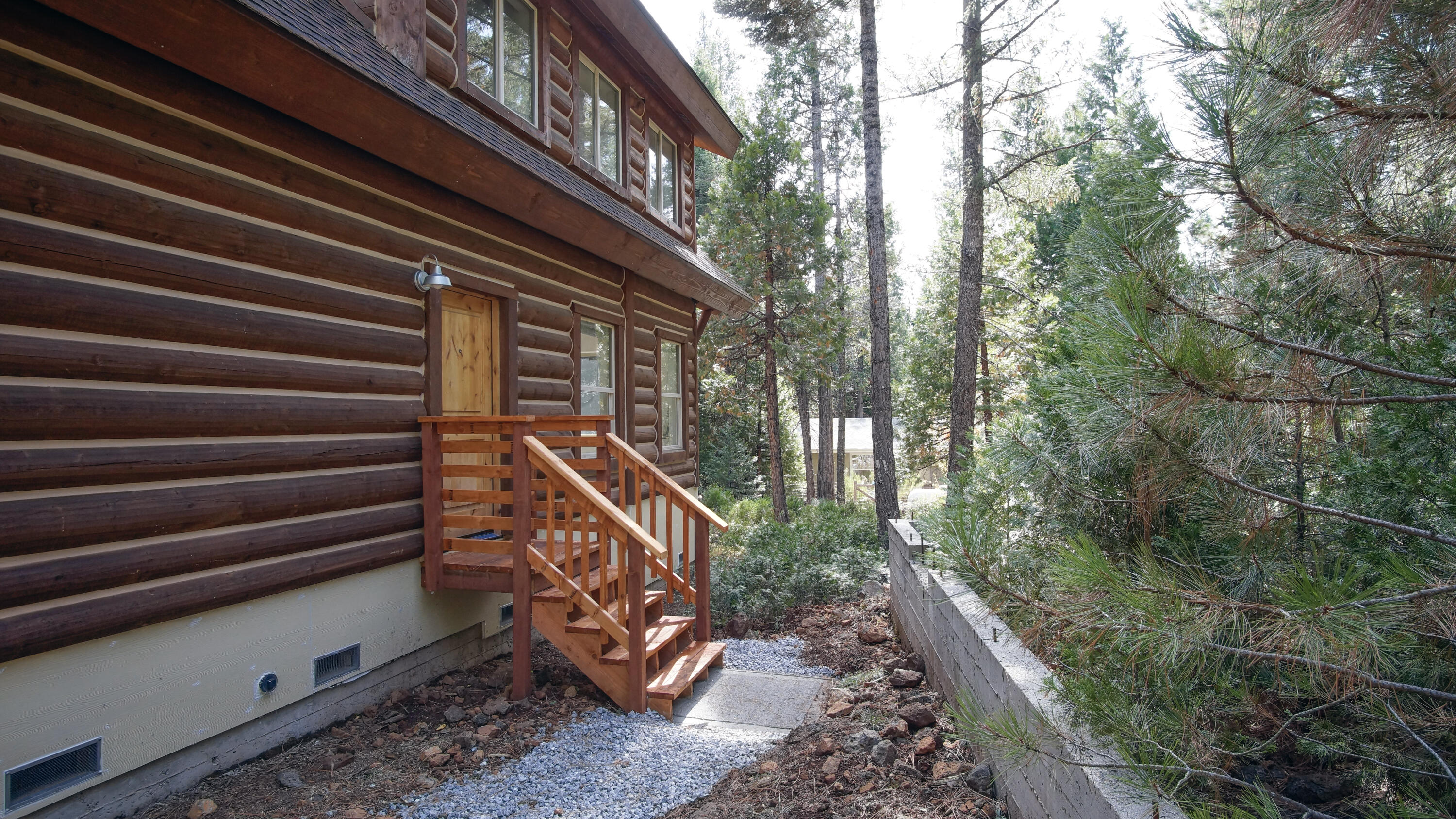 8118 Pine Forest Road Shingletown, CA 96088 - Photo 36 of 38 a view of a house with a yard