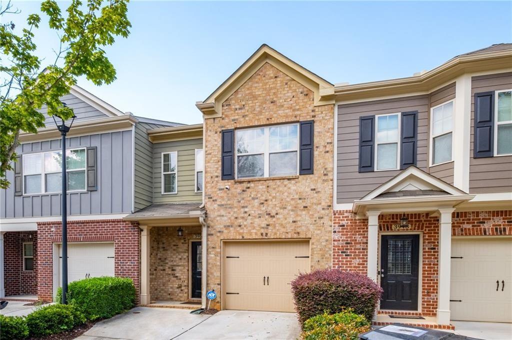 3950 Cyrus Crest Circle Northwest Kennesaw, GA 30152 - Photo 12 of 44 front view of a house with a yard
