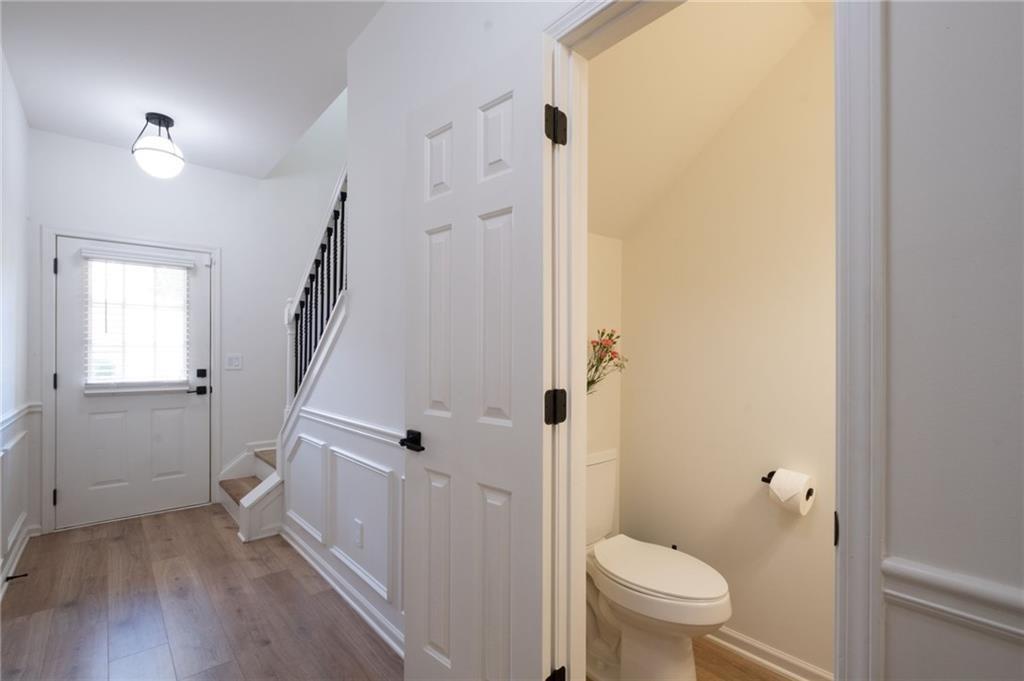 3950 Cyrus Crest Circle Northwest Kennesaw, GA 30152 - Photo 13 of 44 a bathroom with a sink a toilet and shower