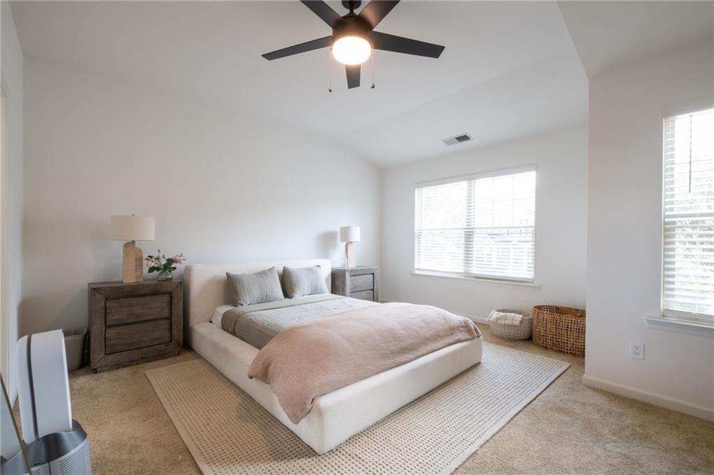 3950 Cyrus Crest Circle Northwest Kennesaw, GA 30152 - Photo 14 of 44 a bedroom with bed and window