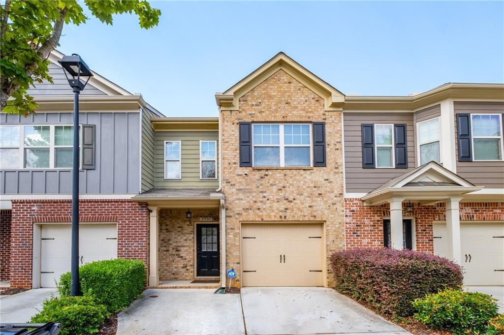 3950 Cyrus Crest Circle Northwest Kennesaw, GA 30152 - Photo 23 of 44 front view of a house with a yard