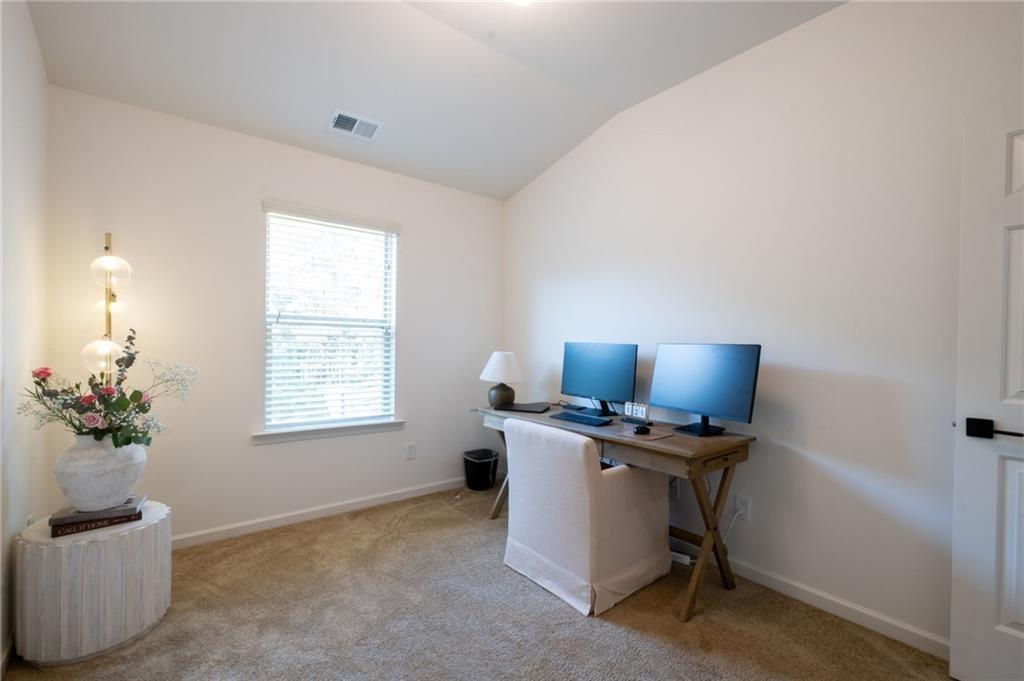 3950 Cyrus Crest Circle Northwest Kennesaw, GA 30152 - Photo 27 of 44 a view of a workspace with furniture and a window
