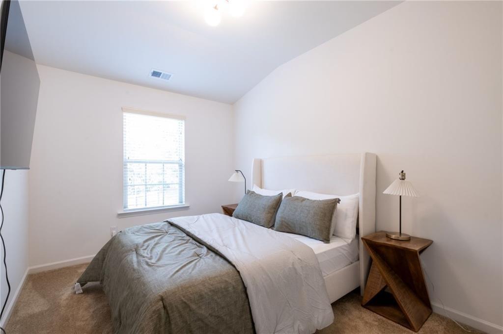 3950 Cyrus Crest Circle Northwest Kennesaw, GA 30152 - Photo 31 of 44 a bedroom with a bed and a window