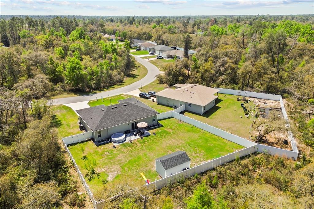 13657 Southwest 33rd Circle Ocala, FL 34473 - Photo 22 of 26 a view of a swimming pool with a patio