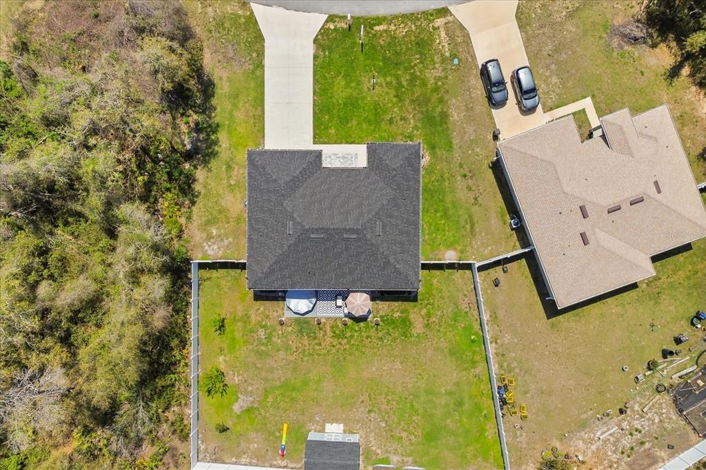 13657 Southwest 33rd Circle Ocala, FL 34473 - Photo 26 of 26 swimming pool view with a garden