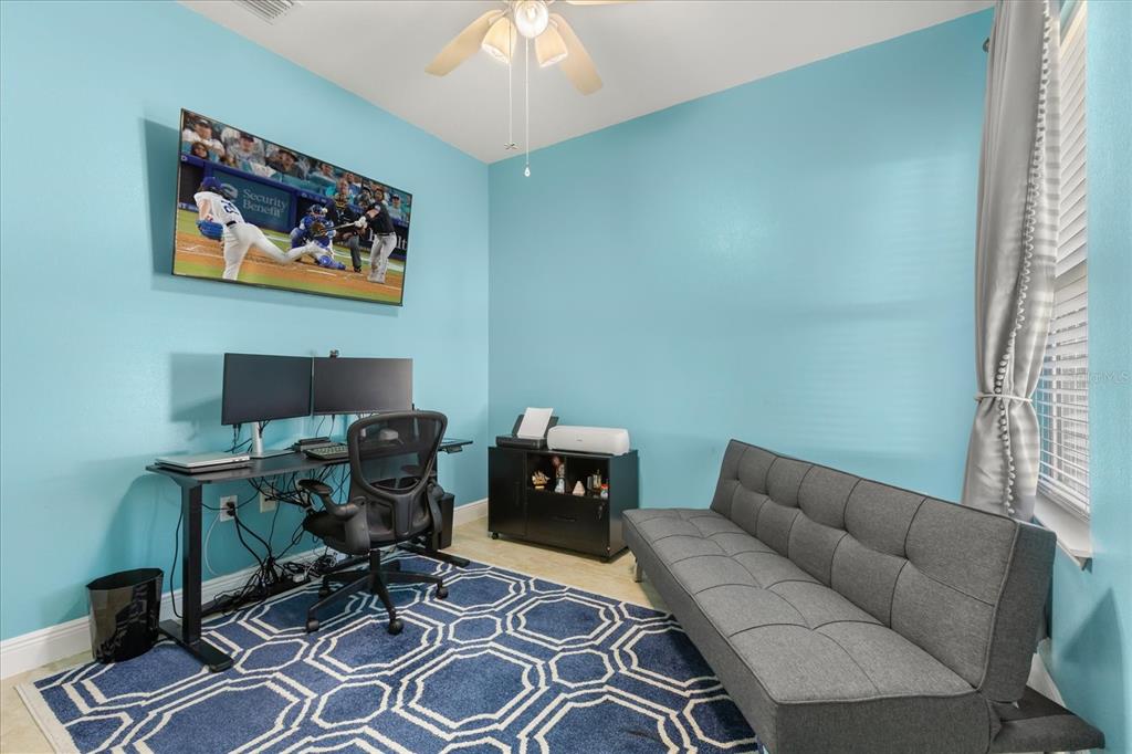 13657 Southwest 33rd Circle Ocala, FL 34473 - Photo 9 of 26 a work room with furniture and a window
