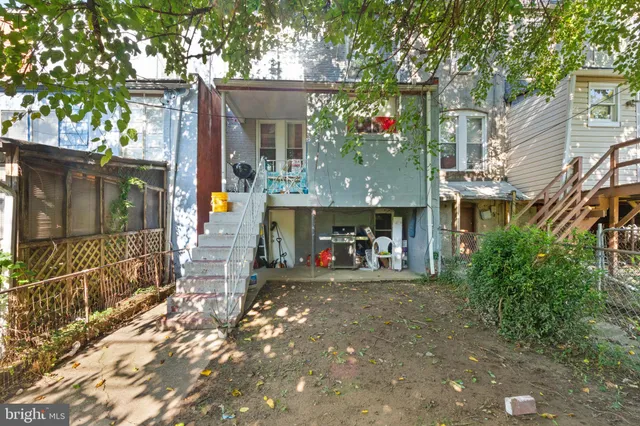 a view of a street with sitting area