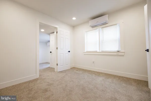 an empty room with window