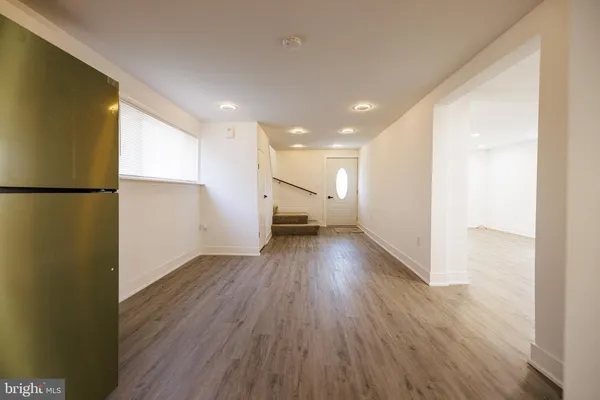 a view of a livingroom with wooden floor