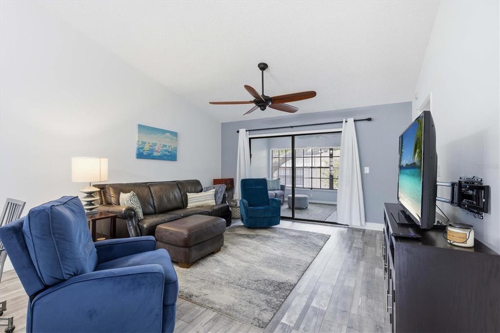 2178 Elm Street, Unit 1007 Dunedin, FL 34698 - Photo 12 of 28 a living room with furniture