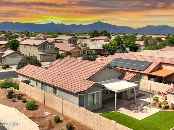 a aerial view of a house with a table and chairs