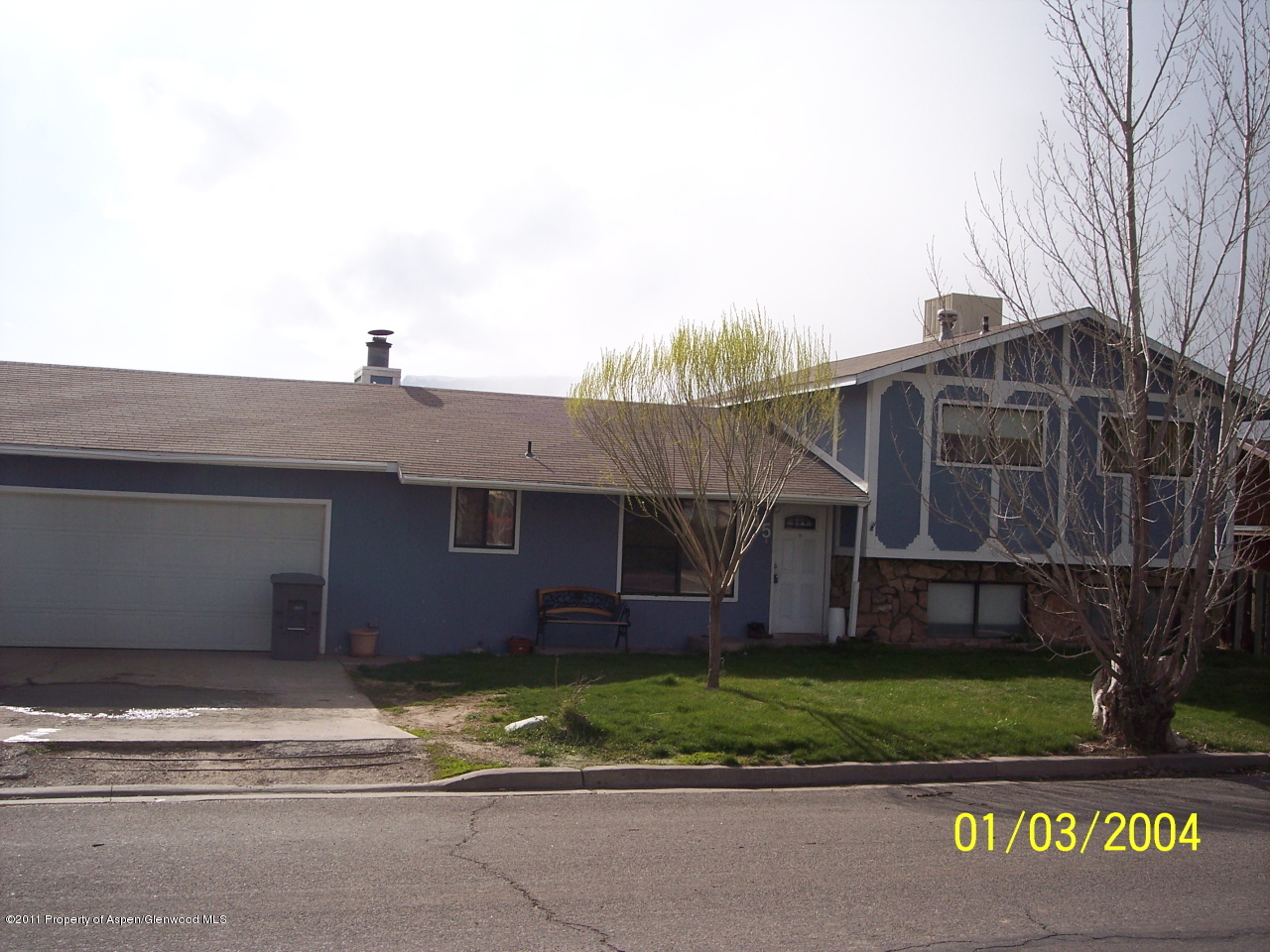 545 Will Rifle, CO 81650 - Photo 1 of 1 a front view of a house with a garden