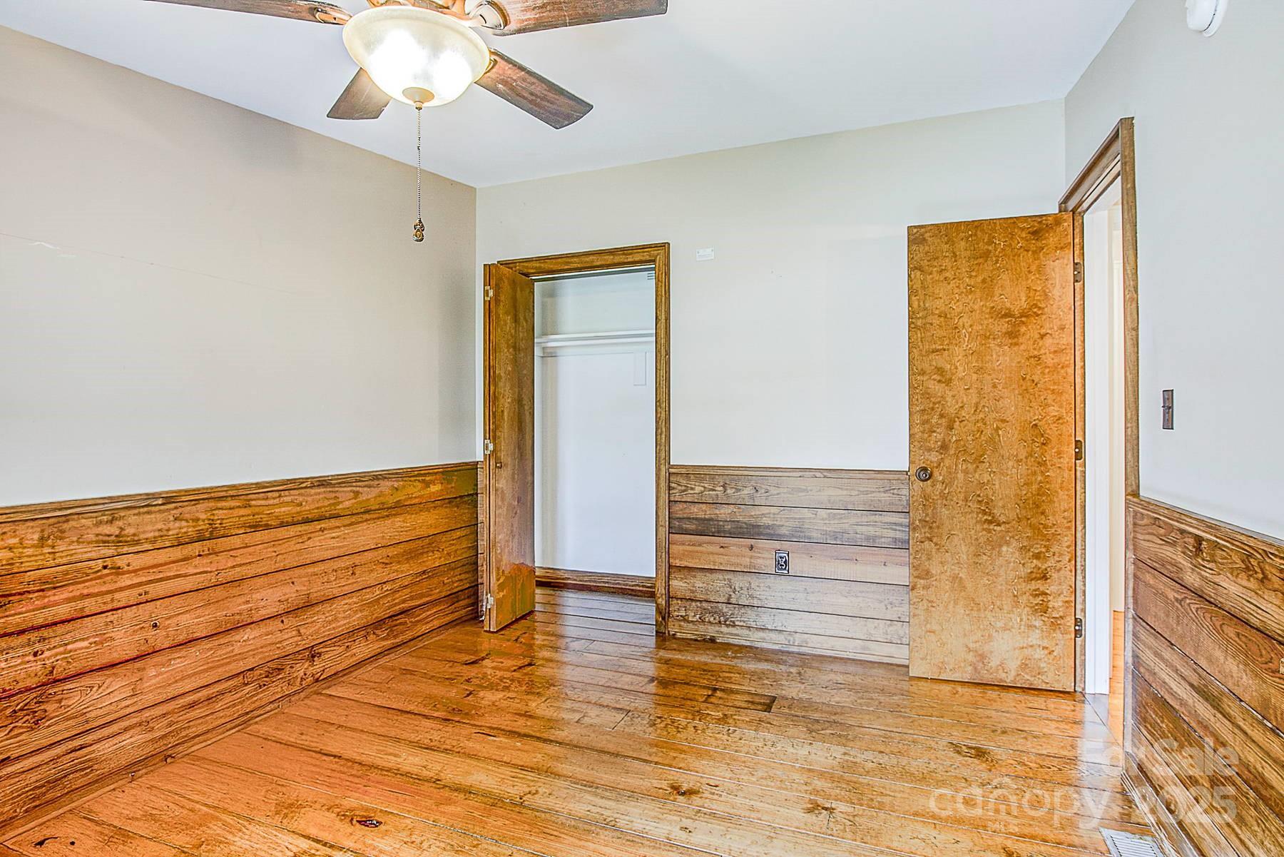 5165 Woodleaf Road Salisbury, NC 28147 - Photo 21 of 48 a view of wooden floor and cabinet in a room