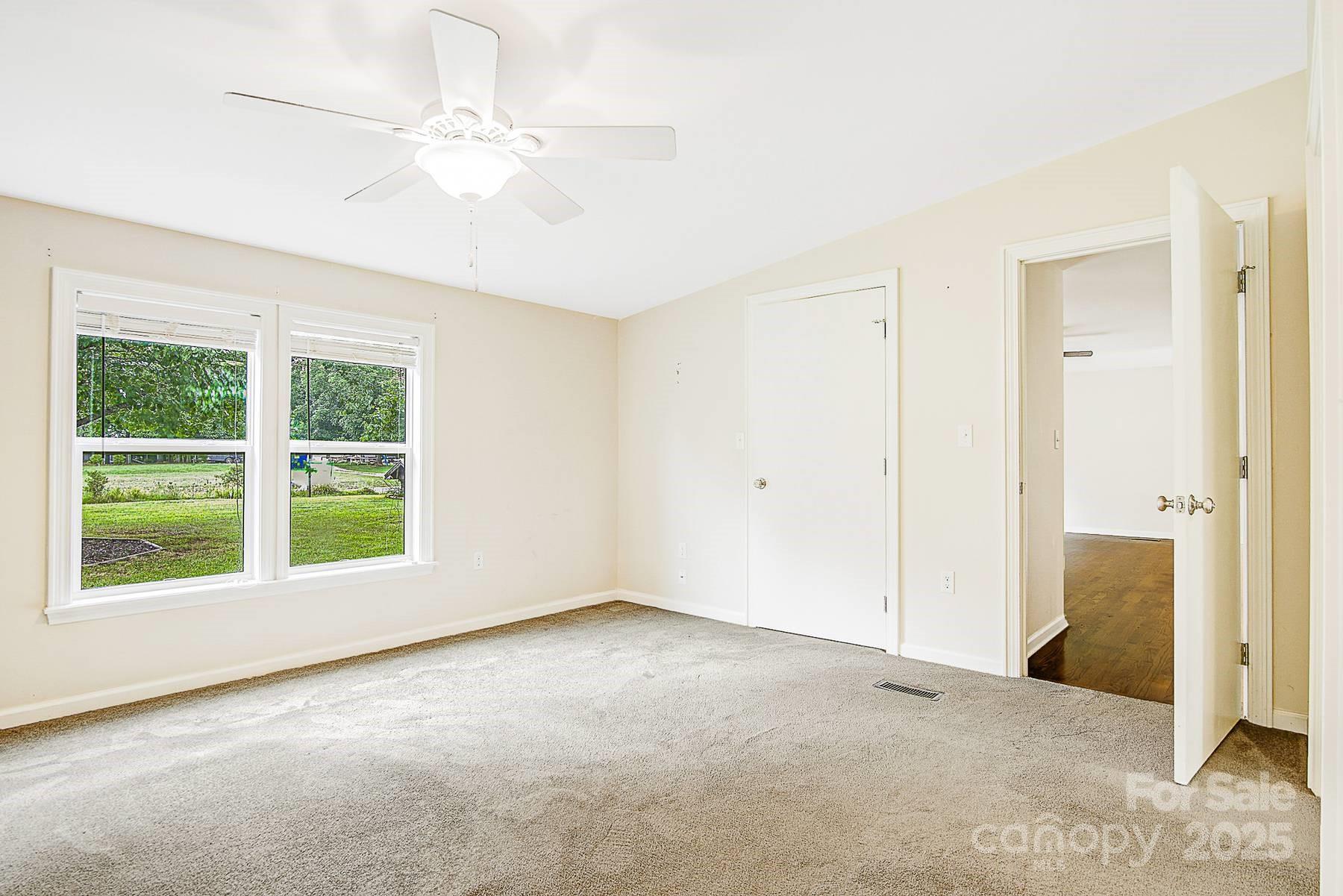 5165 Woodleaf Road Salisbury, NC 28147 - Photo 28 of 48 an empty room with windows and closet