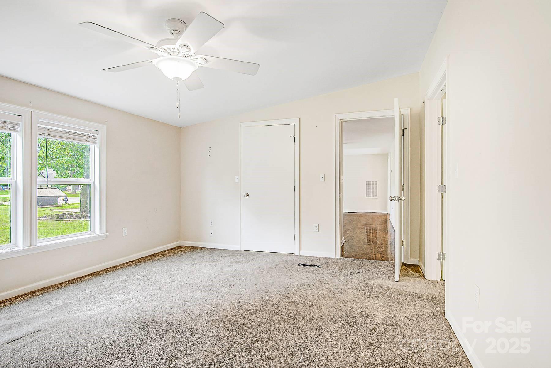 5165 Woodleaf Road Salisbury, NC 28147 - Photo 30 of 48 a view of an empty room with a window