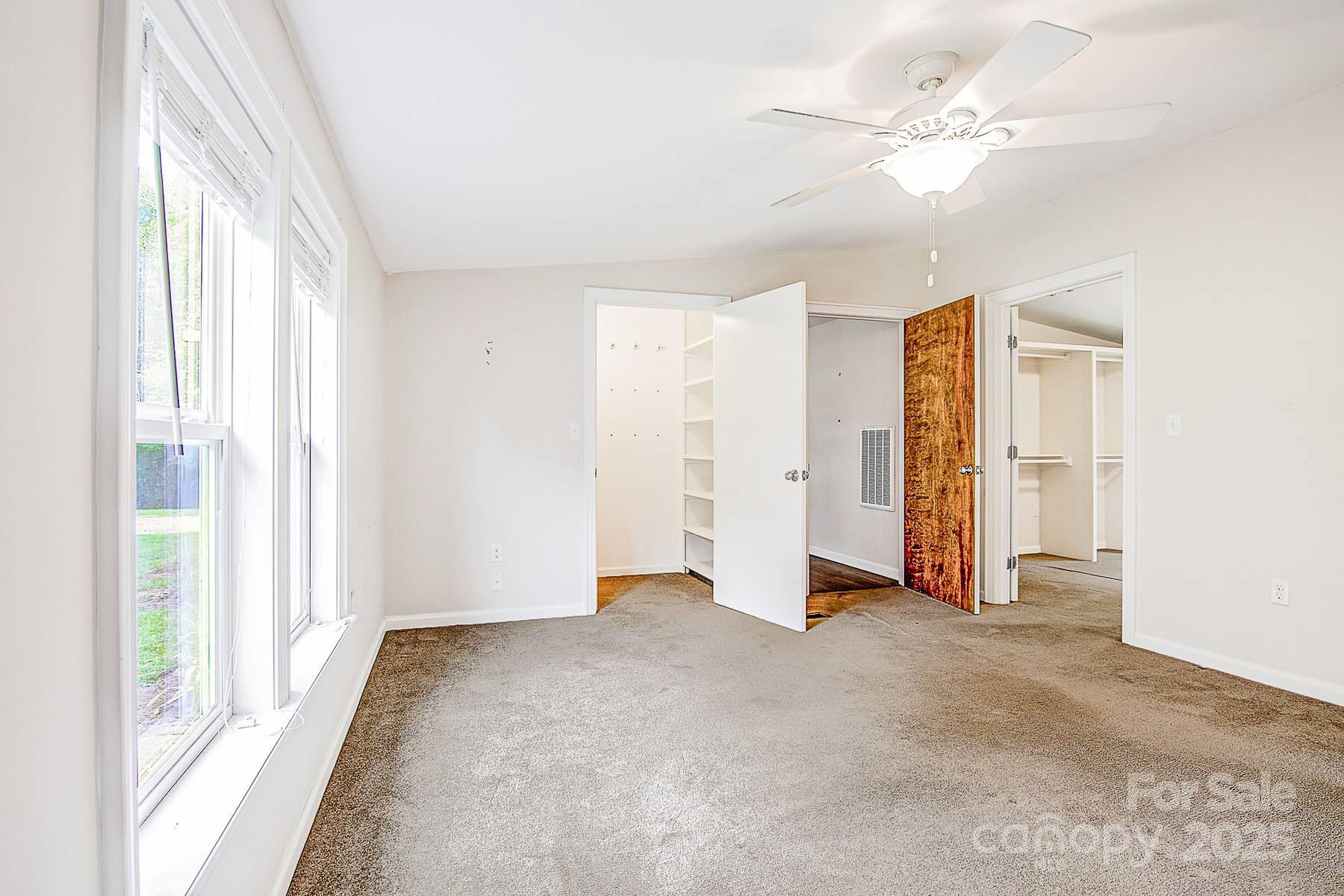 5165 Woodleaf Road Salisbury, NC 28147 - Photo 31 of 48 a view of an empty room with a window
