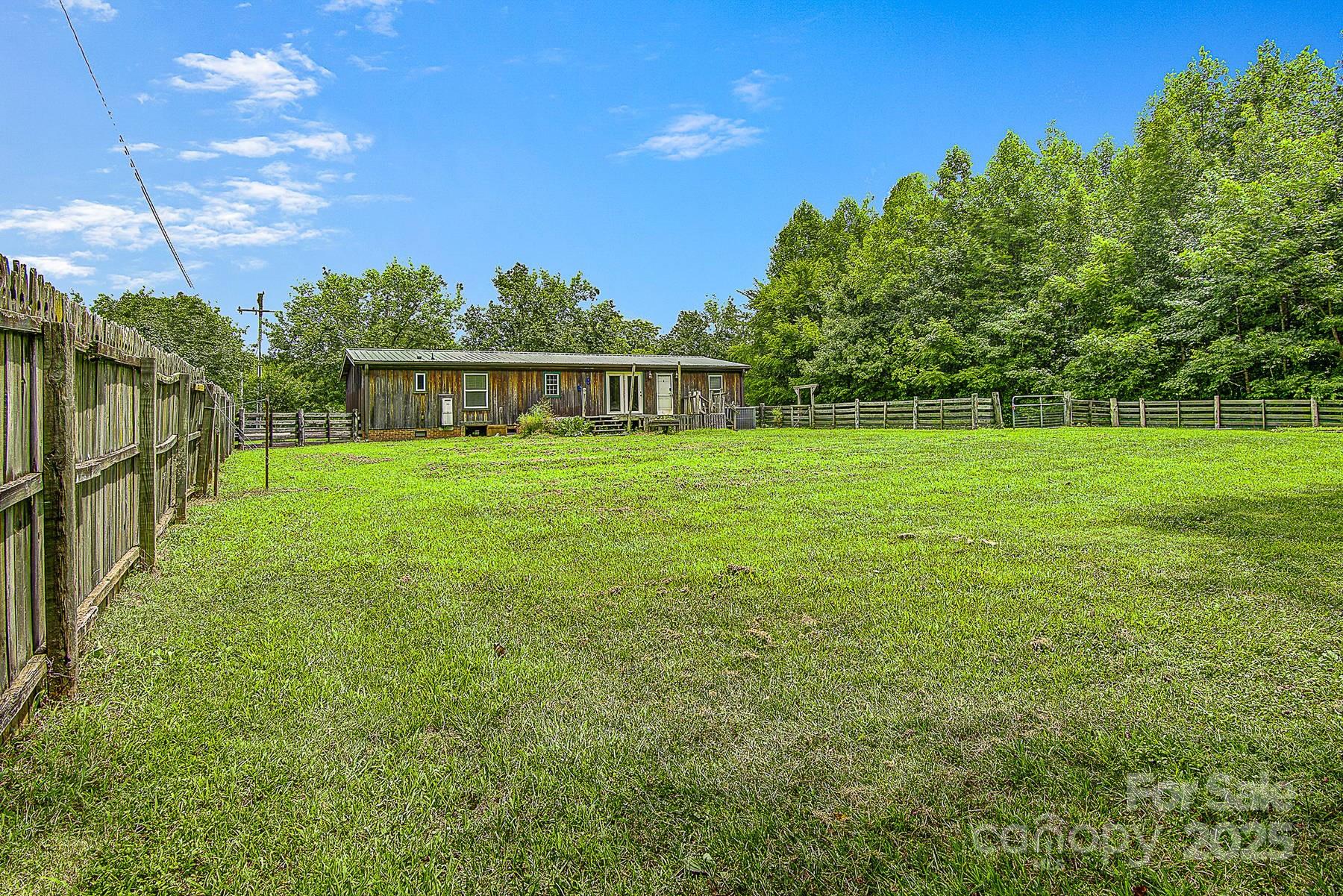5165 Woodleaf Road Salisbury, NC 28147 - Photo 44 of 48 a view of an house with backyard