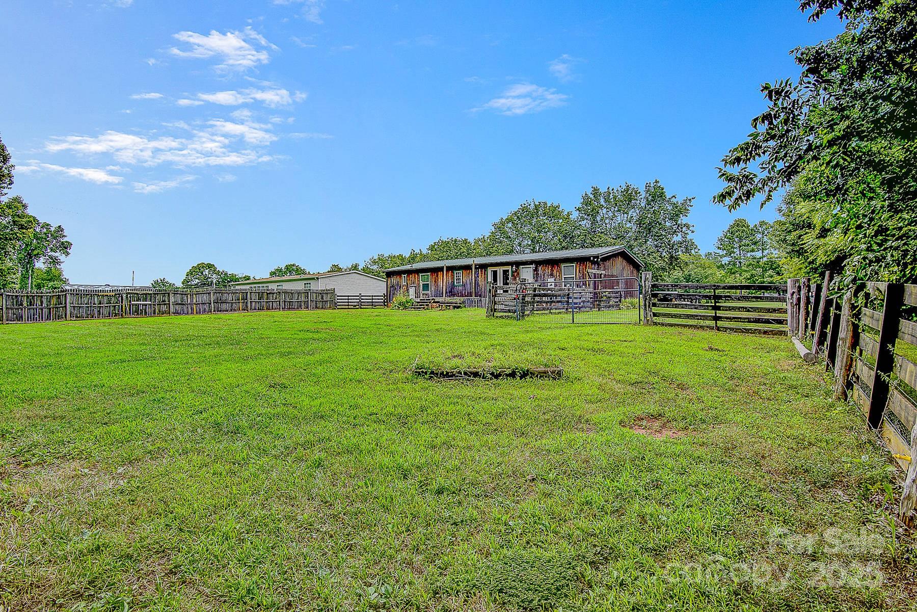 5165 Woodleaf Road Salisbury, NC 28147 - Photo 46 of 48 a view of yard with swimming pool and green space
