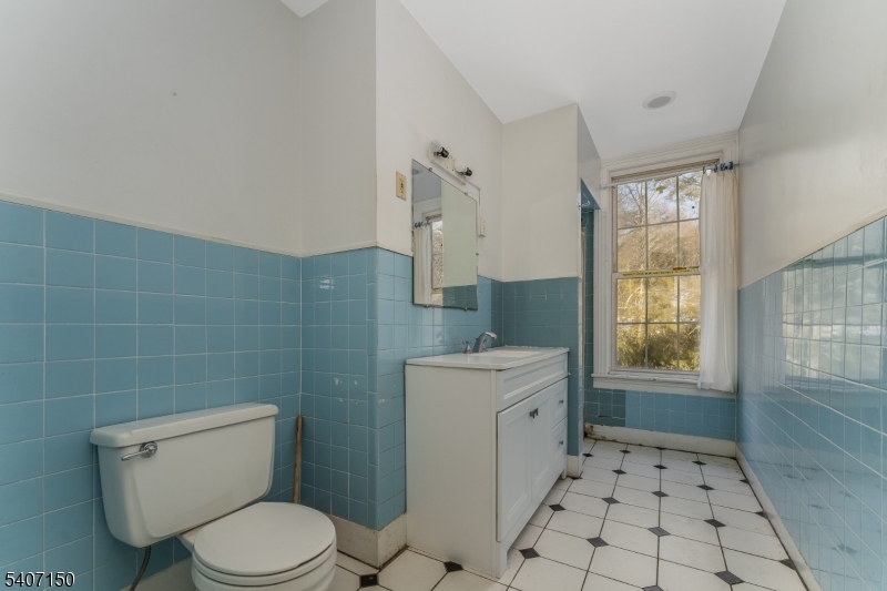 50 Drakestown Road Hackettstown, NJ 07840 - Photo 13 of 47 a bathroom with a toilet a sink and a shower