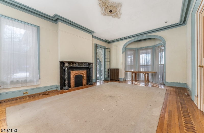 50 Drakestown Road Hackettstown, NJ 07840 - Photo 2 of 47 a view of a livingroom with a fireplace